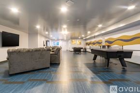 Johnson City apartment for rent - A room with a pool table and a couch.