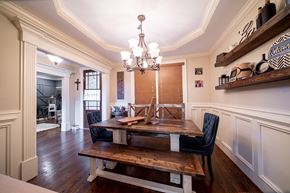 Midland house for rent - A dining room with a wooden table and chairs.