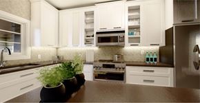 Luxemburg apartment for rent - A kitchen with white cabinets and a brown countertop.