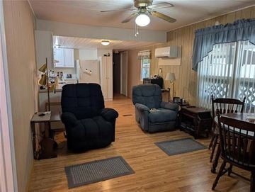 Englewood apartment for rent - A living room with two chairs and a table.