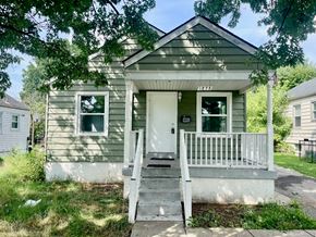Louisville house for rent - A small house with a porch and a white door.