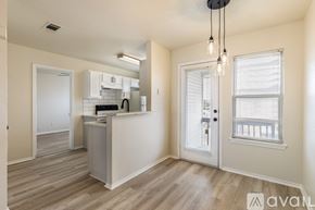 Killeen apartment for rent - A kitchen area with a counter and cabinets.