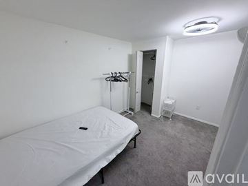 Ellicott City apartment for rent - A mattress is available for rent in a room with white walls.