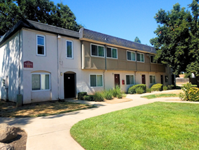 Rancho Cordova apartment for rent - A building with a red sign on the front door.