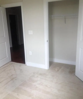 Baltimore house for rent - A room with a white door and a light switch on the wall.