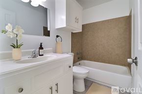 Tulsa apartment for rent - A spacious kitchen and living room with a tile floor.