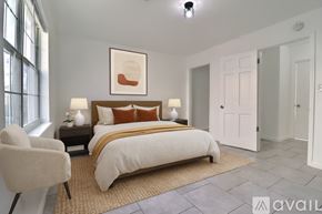 Tulsa apartment for rent - A spacious room with tile flooring and a window.