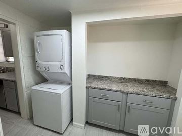 Tucson house for rent - A white oven and microwave in a kitchen.