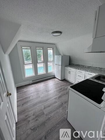 Norwich apartment for rent - A kitchen with a dishwasher and a refrigerator.