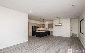 Lake Havasu City house for rent - A spacious room with a kitchen island and pendant lights.