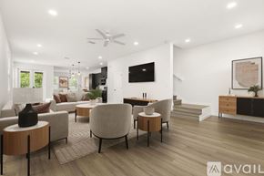 Tampa townhouse for rent - A two-story house with a red door and a balcony.