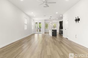Tampa townhouse for rent - A bird's eye view of a residential area with houses and trees.