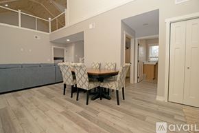 Annandale apartment for rent - A kitchen with wooden floors and cabinets.