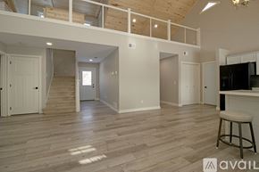 Annandale apartment for rent - A room with wooden flooring and a ceiling fan.