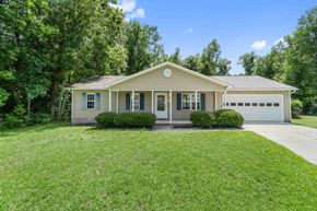 Jacksonville house for rent - A house with a well-maintained lawn in front.