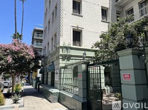 Los Angeles apartment for rent - A street view of a building with a sign that says "NO PARKING ANYTIME".