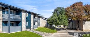 San Antonio apartment for rent - Apartment complex with a green lawn in front.