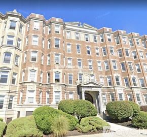 Boston apartment for rent - A large, multi-story building with a symmetrical facade and a central entrance.