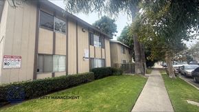 Garden Grove apartment for rent - A building with a sign that says "PRIVATE PROPERTY NO TRESPASSING" is shown.