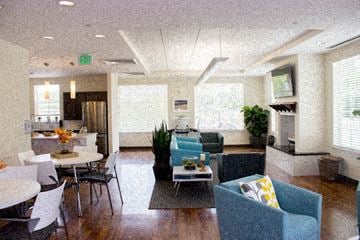 Durham apartment for rent - a living room with couches and tables and chairs