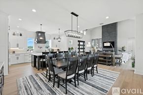 Gainesville house for rent - A modern kitchen with a dining table set for six.