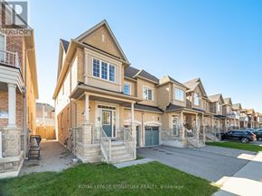 Mississauga (Churchill Meadows) house for rent - A row of houses with the text "ROYAL LEPAGE SIGNATURE REALTY, Brokerage" on the bottom.