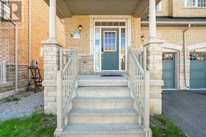 Mississauga (Churchill Meadows) house for rent - A house with a blue door and a sign that says Royal LePage Signature Realty Brokerage.