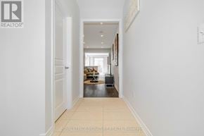 Mississauga (Churchill Meadows) house for rent - A hallway with a Royal LePage Signature Realty logo.