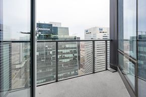 Edmonton apartment for rent - A view from a window of a cityscape with buildings and a sign that says Edmonton.