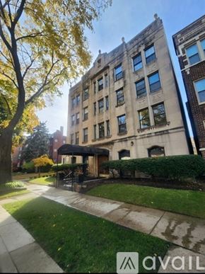 Oak Park apartment for rent - A large building with a tree in front of it.