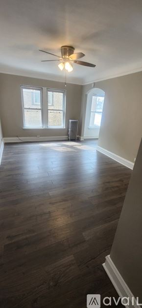Oak Park apartment for rent - A room with a couch and a washing machine.
