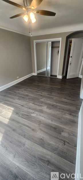 Oak Park apartment for rent - A living room with a fireplace and a rug.