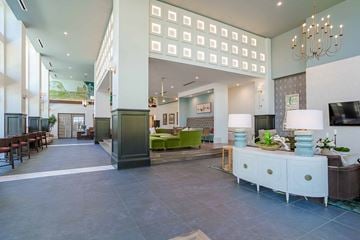 Birmingham apartment for rent - A spacious lobby with a green and white color scheme.