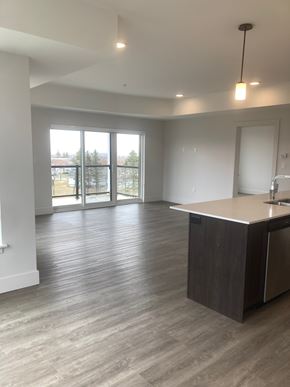 Dartmouth apartment for rent - A spacious room with a reception desk and a view of the outdoors through the windows.