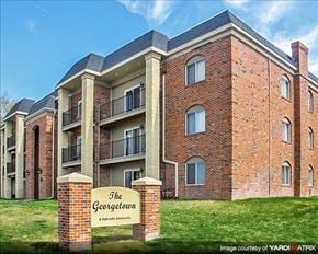 Lincoln apartment for rent - an apartment building with a sign in front of it