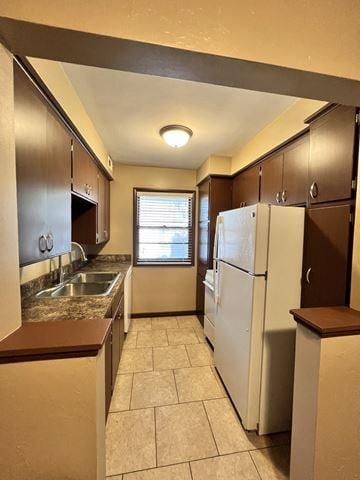 Lincoln apartment for rent - a kitchen with a sink and a refrigerator