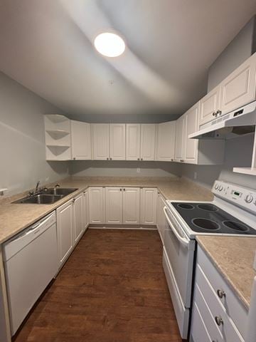 Dartmouth apartment for rent - A kitchen with white cabinets and a stove top oven.