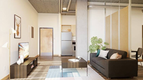 Denver apartment for rent - A living room with a couch, a coffee table, and a television.