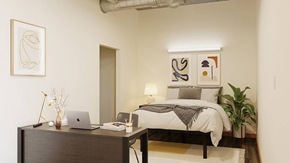 Denver apartment for rent - A bedroom with a bed, desk, and chair.