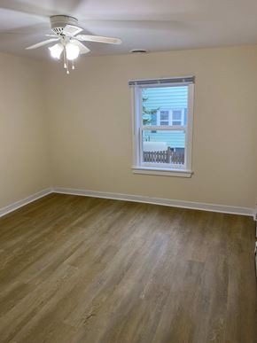 Halifax apartment for rent - A room with a ceiling fan and a window.