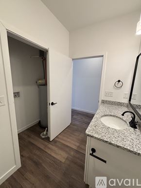 Madison apartment for rent - A line of modern townhouses with a grassy area in front.