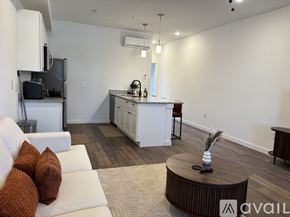 Madison apartment for rent - A bedroom with a large bed and a ceiling fan.