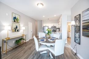 Whitby apartment for rent - A dining room with a white table and chairs.
