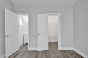 Bay Harbor apartment for rent - Three white doors open to a hallway and a bedroom.