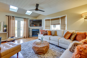 Lumberton Township house for rent - A living room with a fireplace and a television.