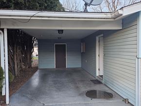 Nampa apartment for rent - A garage with a door and a window is shown.