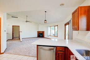 Coralville house for rent - A gym with treadmills, weights, and exercise equipment.