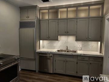 Muskegon apartment for rent - A kitchen with a sink and cabinets.