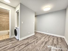 Chicago apartment for rent - A room with a washing machine in it.