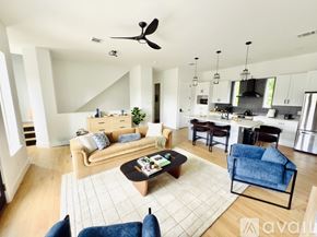 Houston house for rent - A kitchen with a table and chairs in front of it.